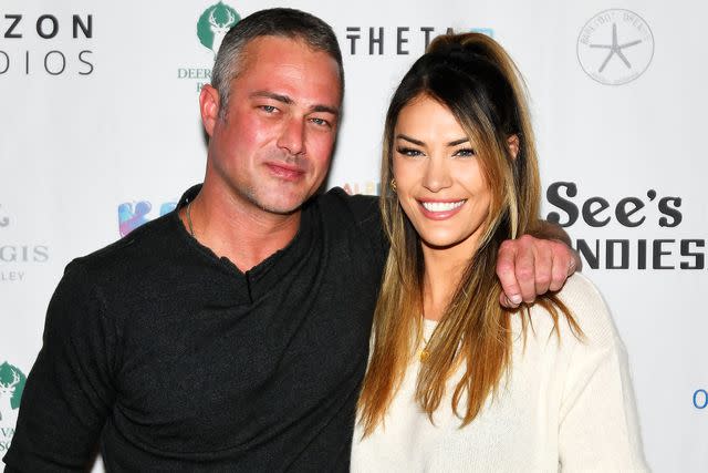 <p>Alex Goodlett/Getty </p> Taylor Kinney and Ashley Cruger
