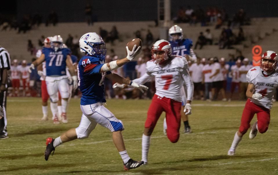 Indio High's Josh Jackson (84) receives the ball and makes it to the end-zone against Desert Mirage, September 22, 2023.