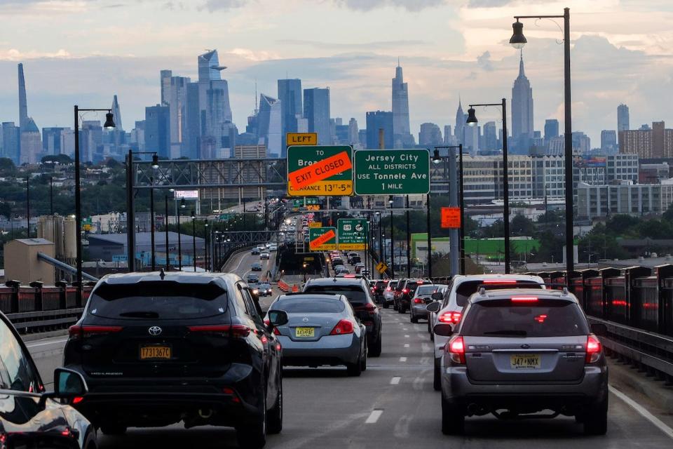 The Empire State Building and Tourist District are seen while Traffic jam is reported along the route to New York City on August 17, 2022, in Jersey City, New Jersey.