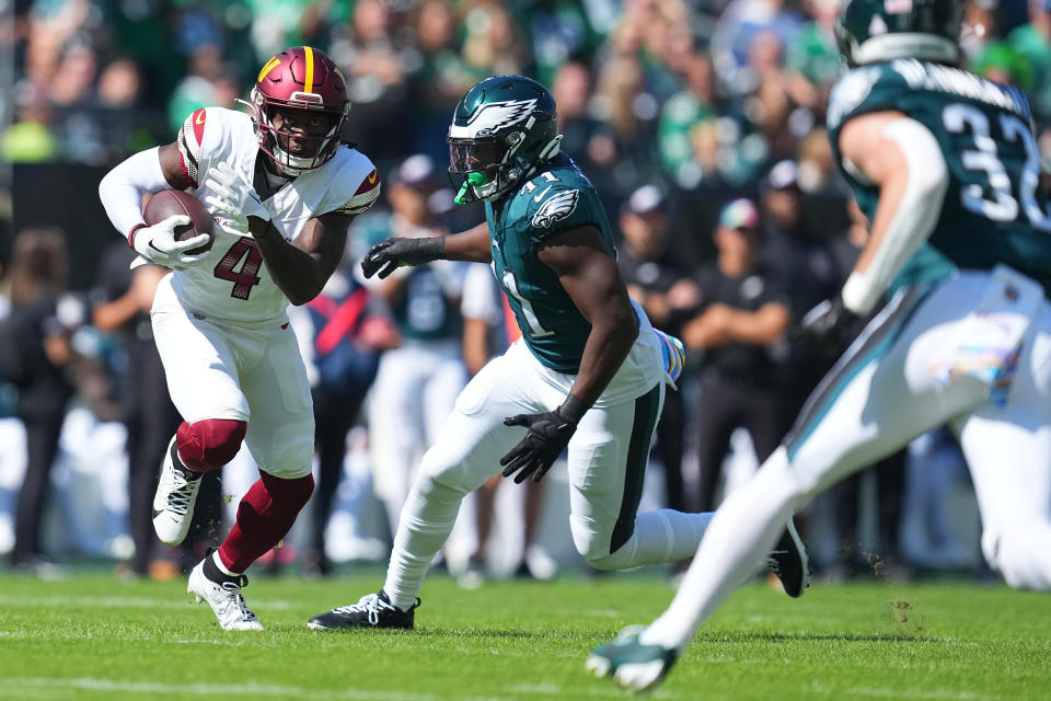 PHILADELPHIA, PENNSYLVANIA – OCTOBER 01: Curtis Samuel #4 of the Washington Commanders runs with the ball after a catch against Nicholas Morrow #41 of the Philadelphia Eagles during the first quarter at Lincoln Financial Field on October 01, 2023 in Philadelphia, Pennsylvania. (Photo by Mitchell Leff/Getty Images)