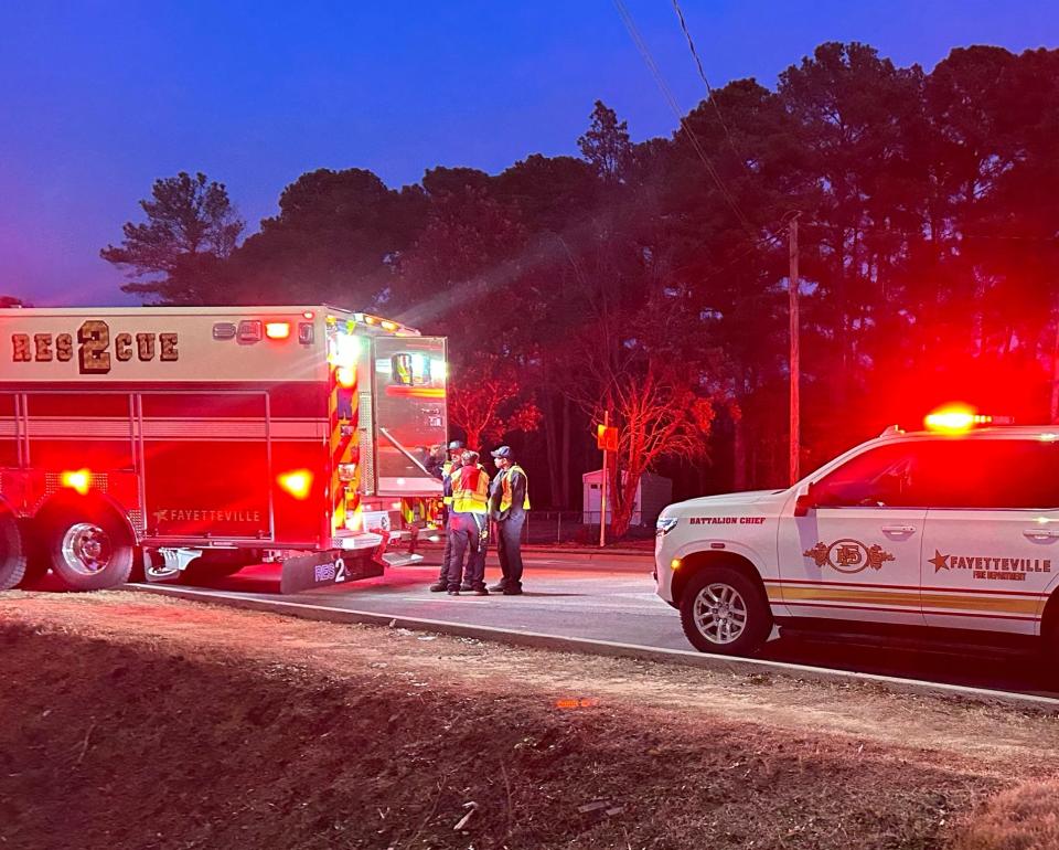 Rescuers stand near a ditch where a young boy fell into a drain hole on Bunce Road on Friday, Jan. 5, 2024. The child was extricated after about 45 minutes and sustained minor injuries, a fire official said.