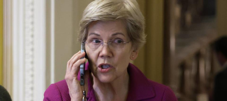 Elizabeth Warren said 'group texts' show why Apple should be broken up as CEO Tim Cook vows to fight antitrust lawsuit