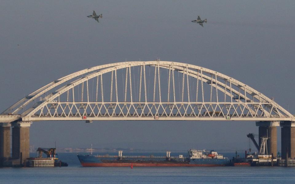 The bridge over the Strait of Kerch cost Russia nearly £3 billion to build - Pavel Rebrov/Reuters