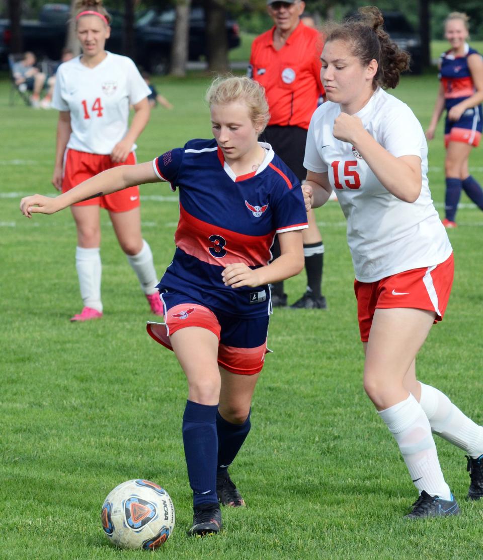 Boyne City's Mackensy Wilson works with the ball past a Benzie Central defender Tuesday.