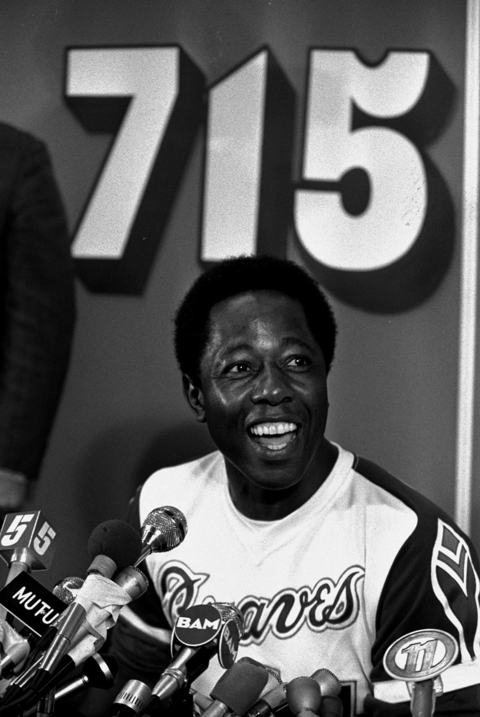 FILE - In this April 8, 1974 file photo, Atlanta Braves baseball player Hank Aaron speaks during a press conference after hitting his 715th home run during a game against the Los Angeles Dodgers, in Atlanta. The 40th anniversary of Hank Aaron's 715th home run finds the Hall of Famer, now 80, coping with his recovery from hip surgery. The anniversary of his famous homer on April 8, 1974 will be celebrated before the Braves' home opener against the Mets on Tuesday night, April 8. (AP Photo/File)