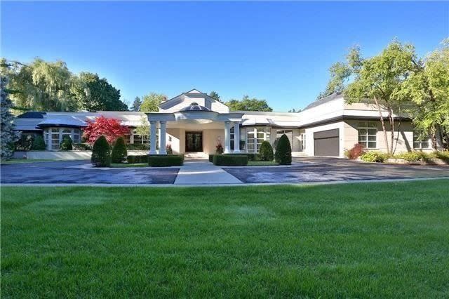 The bungalow is 14,280 square feet and has a 7-car garage.