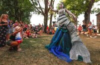 <p>An artist called “La Sirene/The mermaid” takes part in the festival “Statues en Marche” in Marche-en-Famenne, Belgium, July 22, 2018. (Photo: Yves Herman/Reuters) </p>