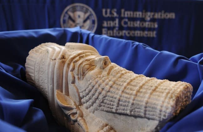 A statue of King Sargon II is displayed before being returned to Iraq in 2015 (Courtesy of ICE)