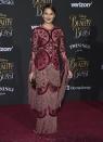 <p>Chrissy opted for gothic glamour in a burgundy fringed design.<br><i>[Photo: AP]</i> </p>