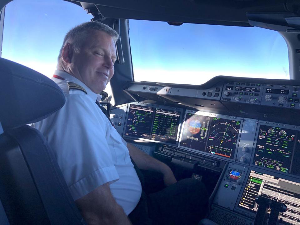 Retired Delta captain Mark Stevens in the cockpit a of an A350.