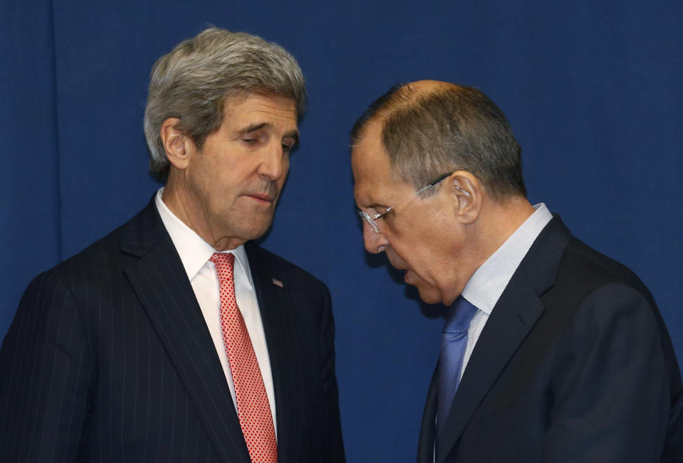 Secretary of State John Kerry talks with Russian Foreign Minister Sergey Lavrov during a meeting to discuss the Ukraine crisis, Thursday, March 6, 2014, at the Conference on International Support to Libya, in Rome. It is the second meeting in as many days between Kerry and Lavrov, who met in Paris on Wednesday to talk about the crisis over the crisis in Ukraine's Crimea Peninsula. (AP Photo/Kevin Lamarque, Pool)