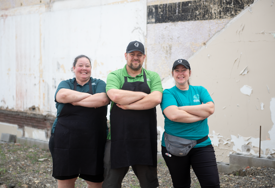 Guido's managers Melissa Long, Scott Hutchinson and Mindy Leonard, stand on the proposed spot of a patio in downtown Ravenna.