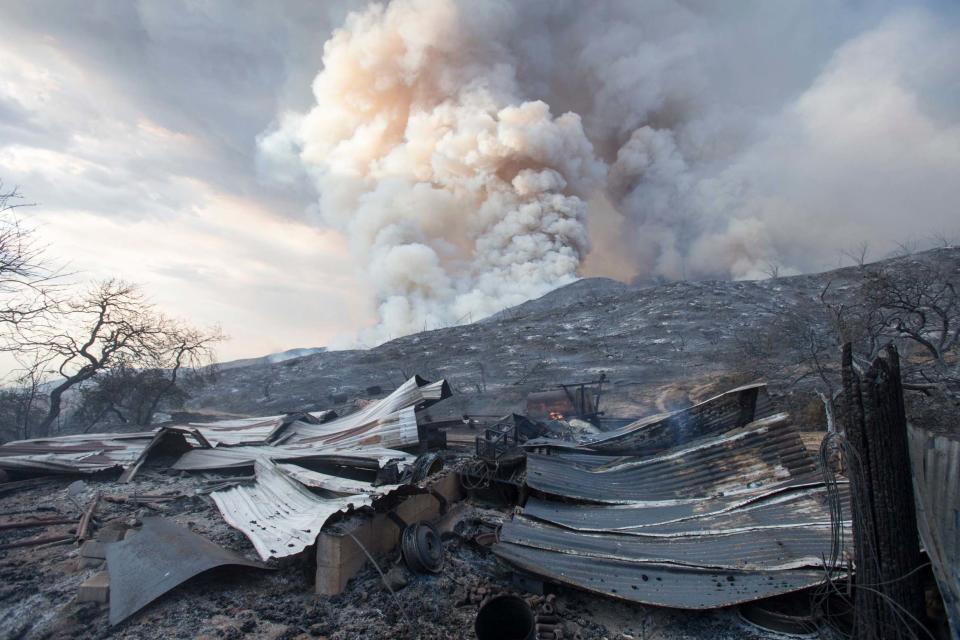 The blaze burnt across the land of Yucaipa, California (AP)