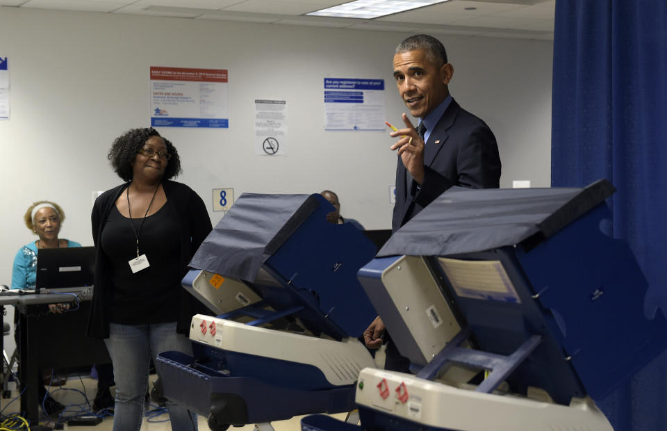 President Barack Obama casts his ballot at the Cook County Office Building in Chicago on Oct. 7, 2016. (Photo: Susan Walsh/AP)