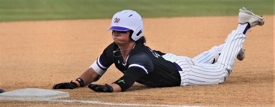 Wylie's Tye Briscoe slides into third with a two-run triple for his team's first runs in a seven-run inning against Abilene High.