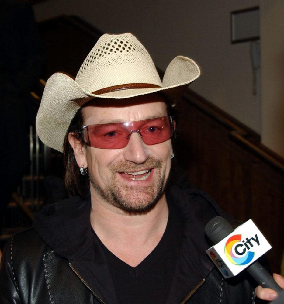 Bono plus cowboy hat.