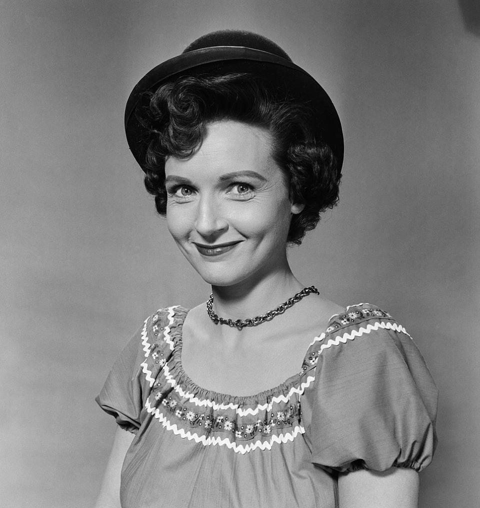 Betty White in 1954 with a small hat on her head