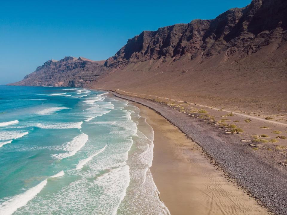 Surf-battered Famara is renowned for riding the waves (Getty Images)