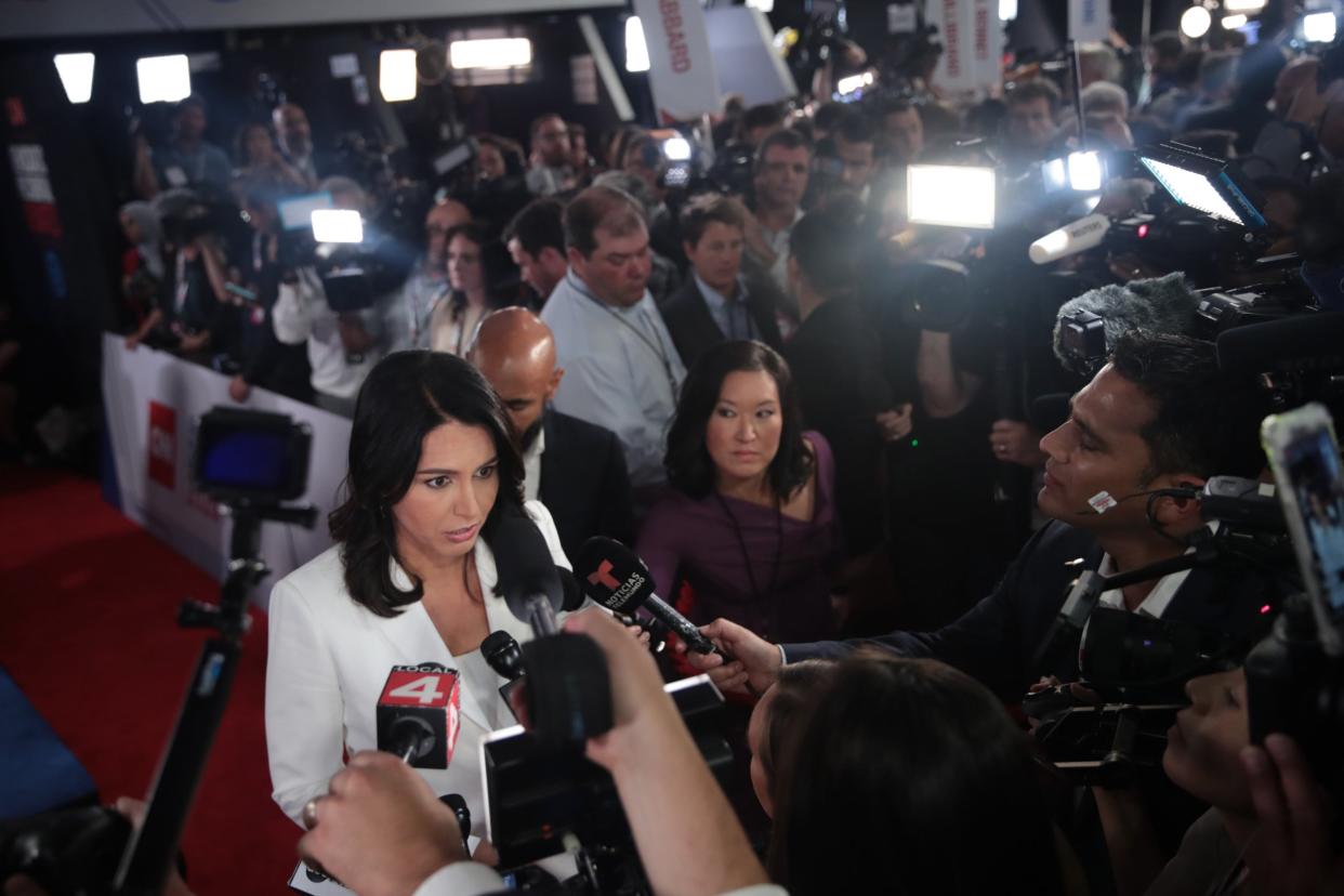 Tulsi Gabbard talks to reporters after the second Democratic debate in Detroit: Getty Images