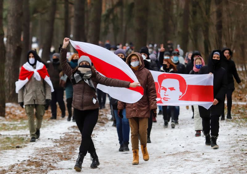 Belarusian opposition supporters hold a rally in Minsk