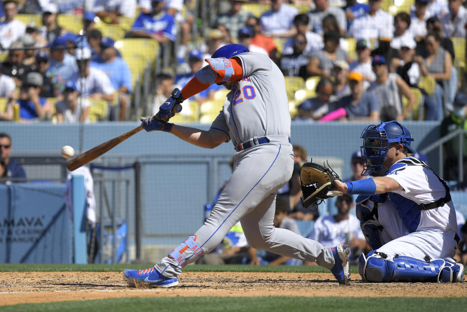 New York Mets' Pete Alonso hits an RBI double during the eighth inning of a baseball game against the Los Angeles Dodgers Sunday, June 5, 2022, in Los Angeles. (AP Photo/Mark J. Terrill)