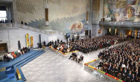 Picture shows the general view of the hall during the Nobel Peace Prize awards ceremony at the City Hall in Oslo December 10, 2014. REUTERS/Heiko Junge/NTB Scanpix/Pool