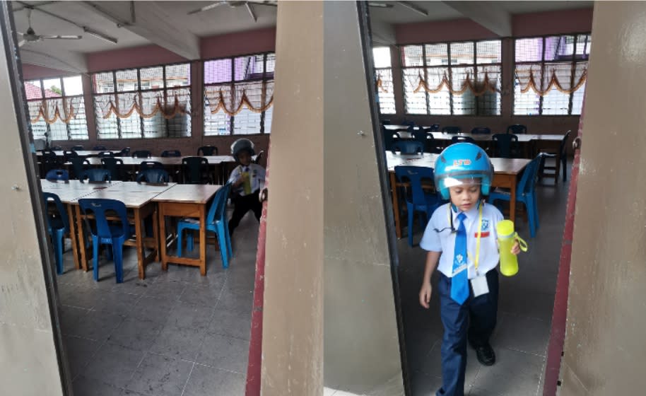 Fadli’s son, Asyraff, quickly runs back out of class once retrieving his bottle. — Picture via Facebook/Mohd Fadli Salleh.