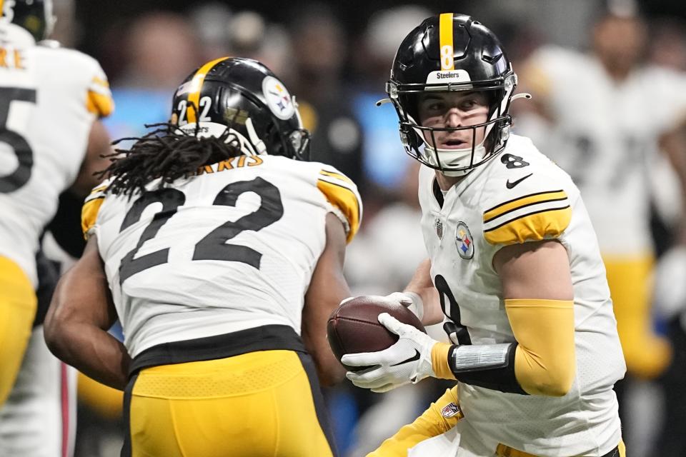 Pittsburgh Steelers quarterback Kenny Pickett (8) works against the Atlanta Falcons during the first half of an NFL football game, Sunday, Dec. 4, 2022, in Atlanta. (AP Photo/Brynn Anderson)