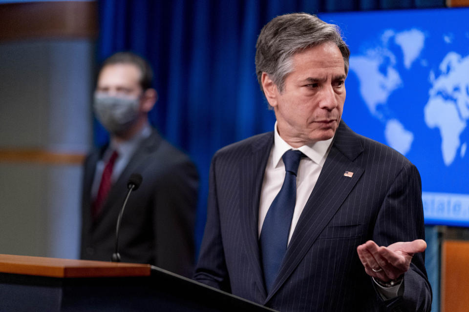 Secretary of State Antony Blinken, right, accompanied by International Religious Freedom Senior Official Dan Nadel, left, speaks at a news conference to announce the annual International Religious Freedom Report at the State Department in Washington, Wednesday, May 12, 2021. (AP Photo/Andrew Harnik, Pool)