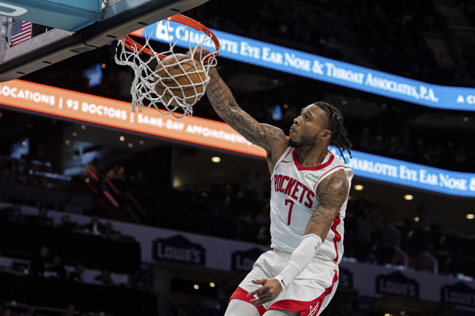 Houston Rockets forward Cam Whitmore dunks against the Charlotte Hornets during the first half of an NBA basketball game Friday, Jan. 26, 2024 in Charlotte, N.C. (AP Photo/Jacob Kupferman)
