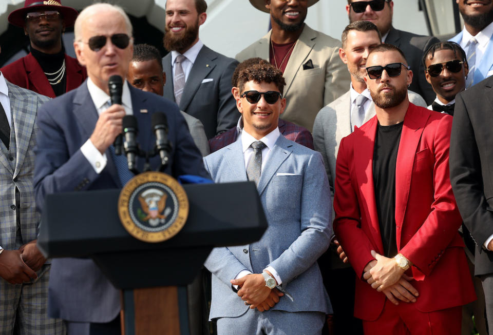 WASHINGTON, DC - JUNE 05: Quarterback Patrick Mahomes (C) and tight end Travis Kelce of the NFL Kansas City Chiefs look on as U.S. President Joe Biden speaks at the White House on June 05, 2023 in Washington, DC. The Chiefs are the 2023 Super Bowl champions.  (Photo by Kevin Dietsch/Getty Images)