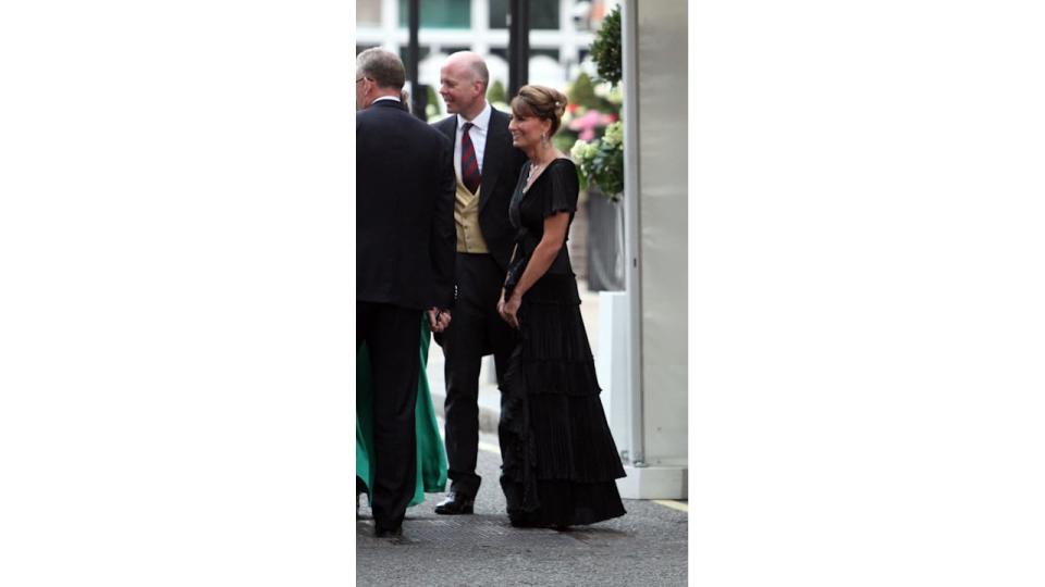 Carole Middleton in a black tiered gown with her hair up