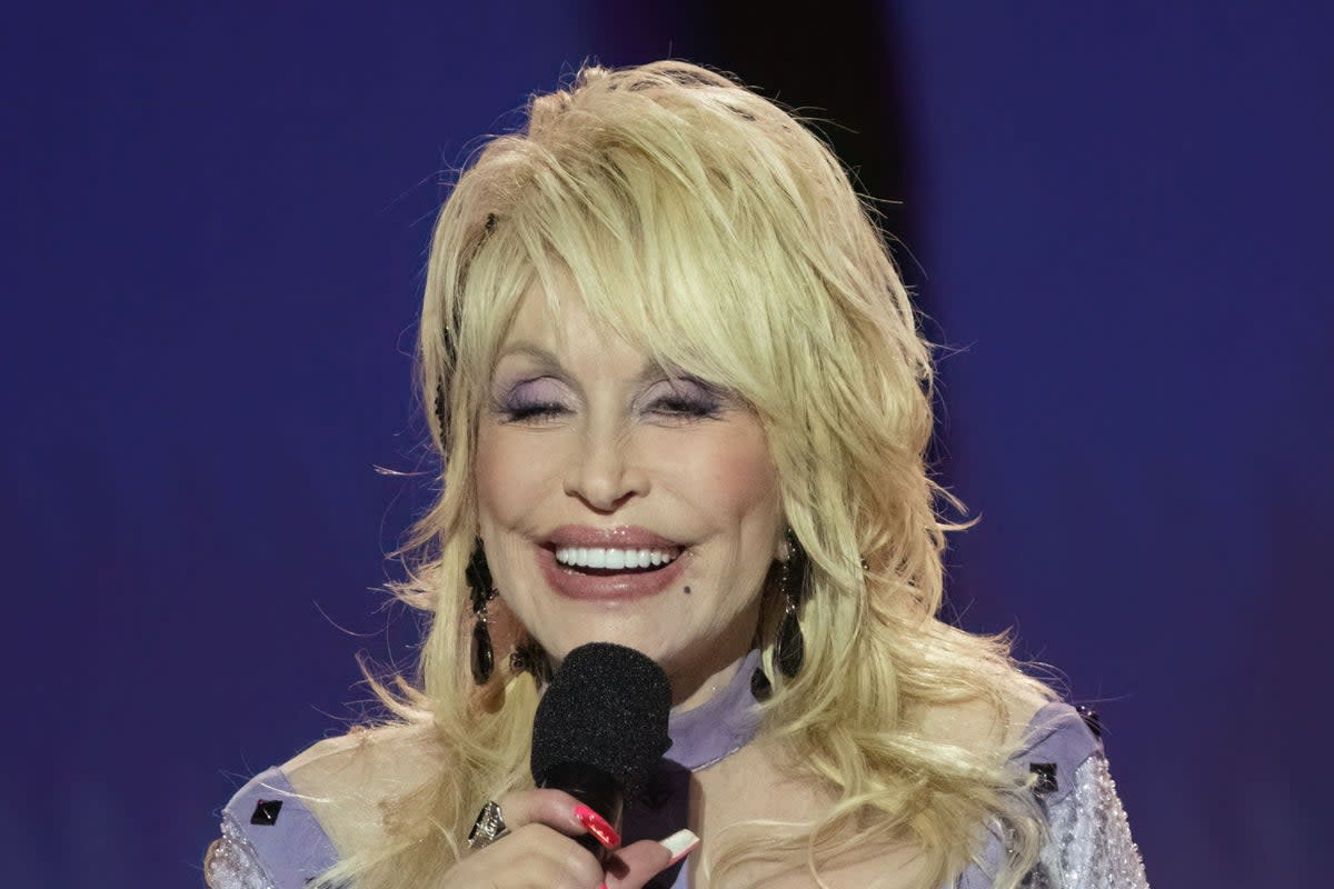 Dolly Parton has spoken about how she would like to be remembered  (AFP via Getty Images)