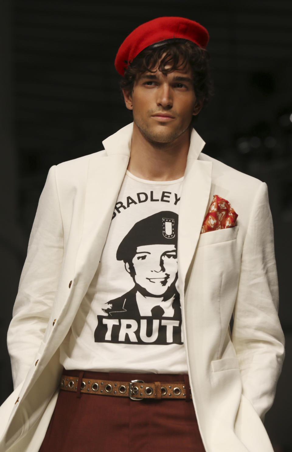 A model wears a creation for Vivienne Westwood men's Spring-Summer 2014 collection, part of the Milan Fashion Week, unveiled in Milan, Italy, Sunday, June 23, 2013. The shirt portrays US Army soldier Bradley Manning, who was arrested in 2010 on suspicion of having made public classified material through the website WikiLeaks. (AP Photo/Luca Bruno)