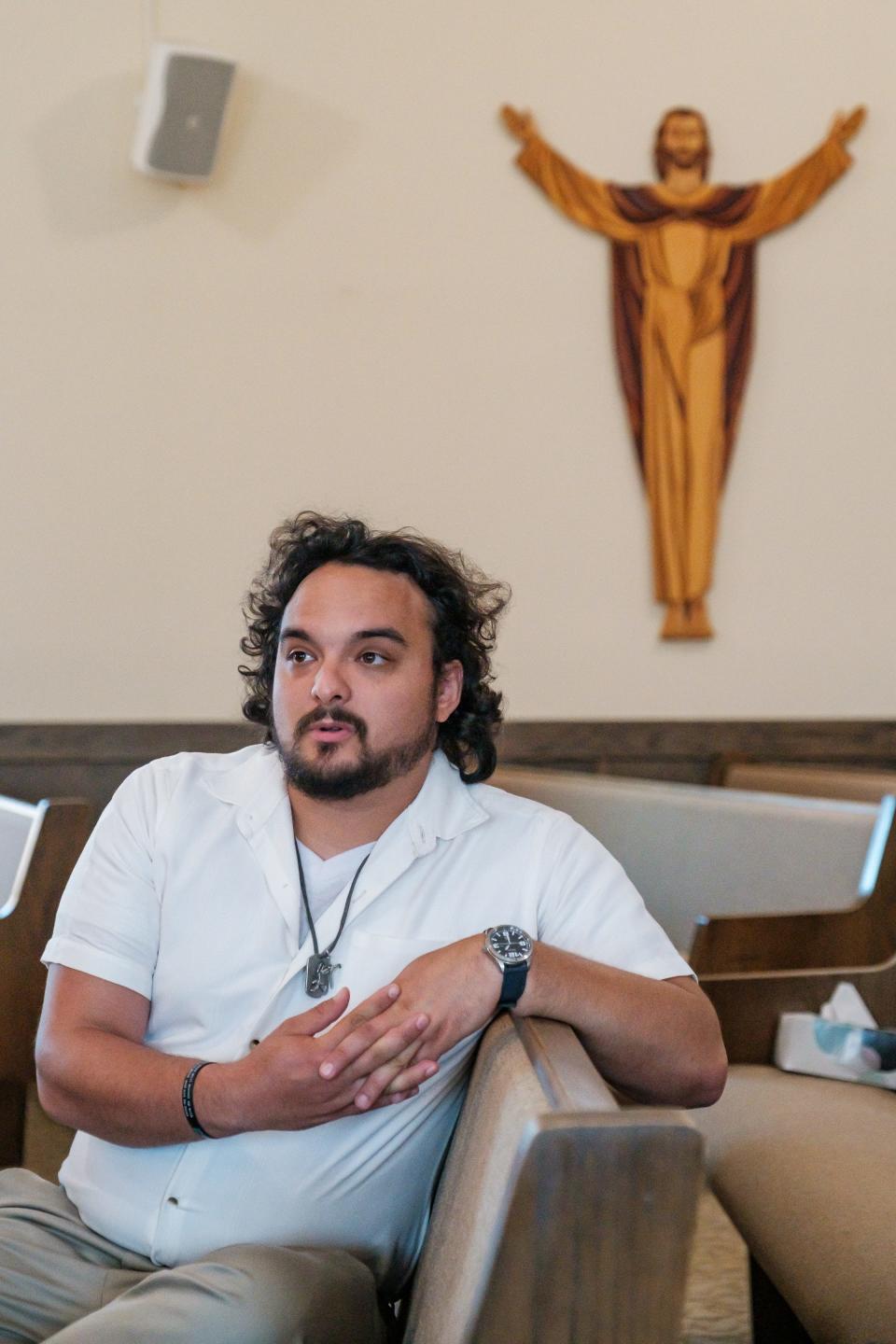 Pastor Kory Rowland reflects upon disaffiliation from the Methodist Church while sitting in pew at Broadway Global Methodist Church in New Philadelphia.