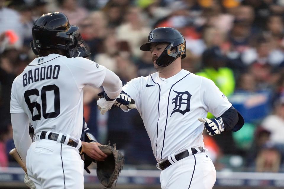 Detroit Tigers' Jake Rogers is greeted at home plate by Akil Baddoo after a solo home run during the third inning against the New York Yankees, at Comerica Park in Detroit on Wednesday, Aug. 30, 2023.