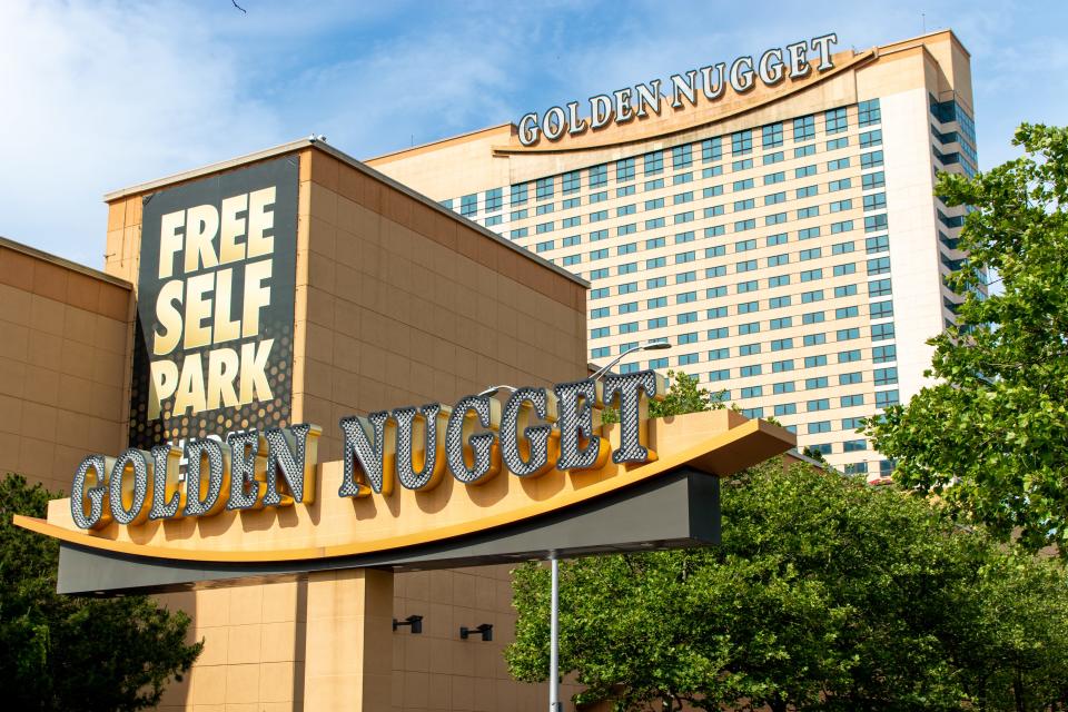 Golden Nugget sign with hotel in background