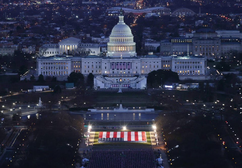 The striking display fills the space where thousands of people would usually stand to witness history unfold. (Photo: JOE RAEDLE via Getty Images)