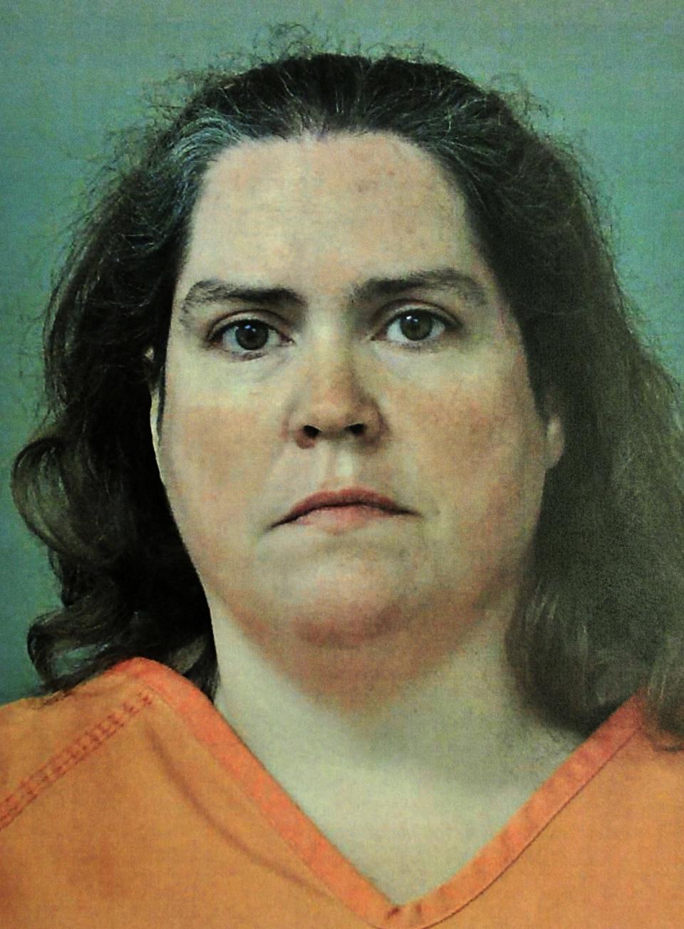 This photo provided by the Madison County, Ala., Sheriff's Department shows Rhonda Jean Carlson, who received a life sentence Wednesday, Oct. 27, 2021, for helping her husband plan the 2015 killings of his estranged pregnant wife, her unborn child and three others. Carlson, 48, avoided the death penalty in a deal with prosecutors in exchange for testifying against her husband, Christopher Henderson, prior to his trial. She admitted to helping plan the attack and was sentenced to life in prison without the possibility of parole. (Madison County Sheriff's Department/AL.com, via AP, File)