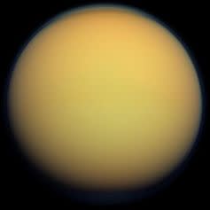 <span class="caption">Titan in true color.</span> <span class="attribution"><span class="source">NASA</span></span>