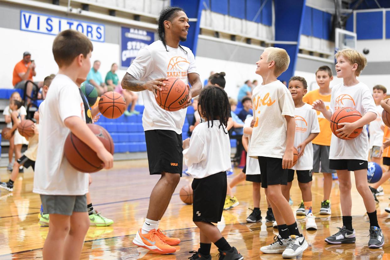 Tennessee Vol’s Zakai Zeigler interacts with kids at a basketball camp run by the Vols’ Zakai Zeigler, at Grace Christian Academy in Karns, Tenn., Saturday, July 13, 2024.