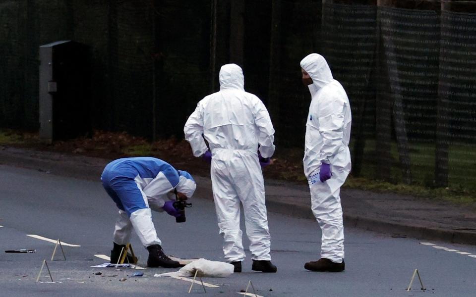 Police forensic officers work outside the Wockhardt pharmaceutical plant in Wrexham - Phil Noble/Reuters