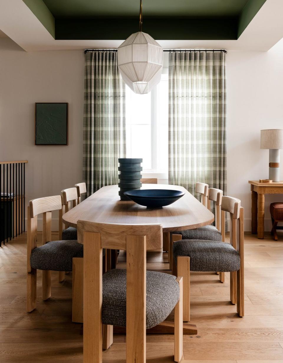 a dining room table with chairs