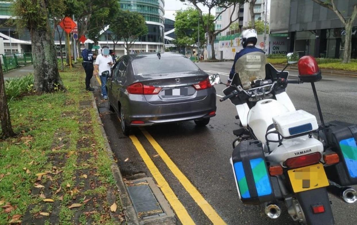 A Land Transport Authority enforcement operation on illegal car-pooling services during COVID-19 circuit breaker period. (PHOTO: LTA)