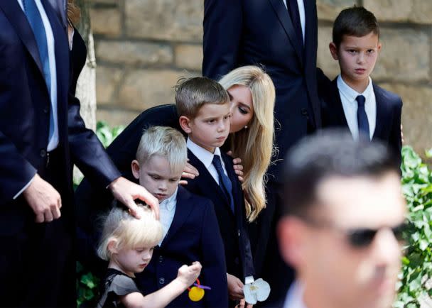 PHOTO: Ivanka Trump kisses one her sons as they arrive to observe the coffin with the remains of Ivana Trump, first wife of former US President Donald Trump, as it enters St. Vincent Ferrer Roman Catholic Church in New York, July 20, 2022. (Jason Szenes/EPA-EFE/Shutterstock)
