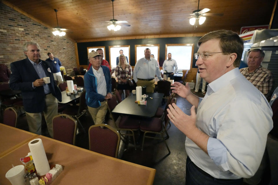 Mississippi Republican Gov. Tate Reeves, who is seeking reelection, speaks with supporters at a campaign breakfast at a Columbus, Miss., restaurant, Monday, Oct. 23, 2023. Reeves faces the Democratic nominee Brandon Presley, current Mississippi Public Service Commissioner for the Northern District, in his bid for reelection, on Nov. 7. (AP Photo/Rogelio V. Solis)