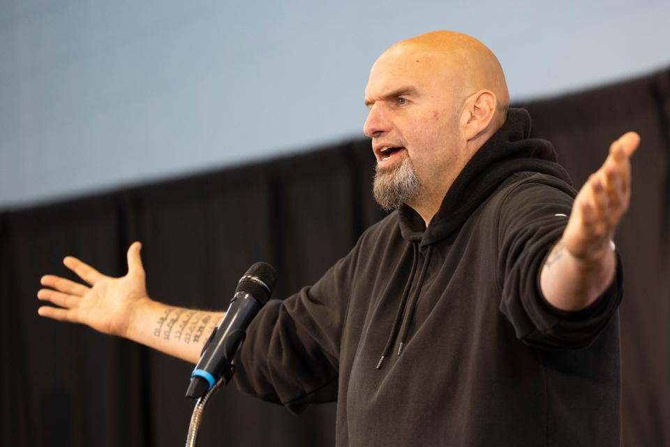 Pennsylvania Lt. Gov. John Fetterman, Democratic candidate for U.S. Senate, accompanied by Rep. Dwight Evans, D-Pa., speaks in Philadelphia, Saturday, Sept. 24, 2022.