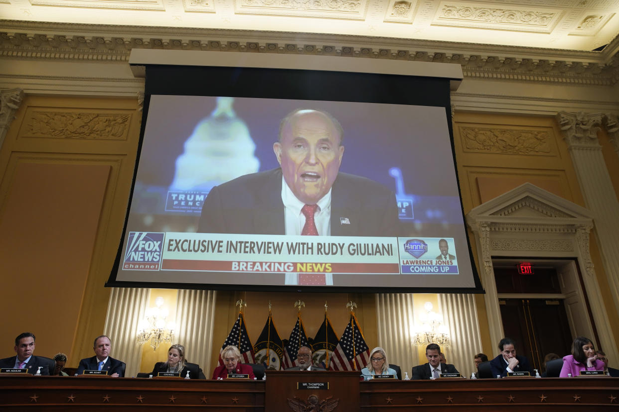 Giuliani is displayed on a screen during Monday's House hearing. 