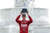 Marcus Ericsson, of Sweden, celebrates winning the first race of the IndyCar Detroit Grand Prix auto racing doubleheader on Belle Isle in Detroit, Saturday, June 12, 2021. (AP Photo/Paul Sancya)