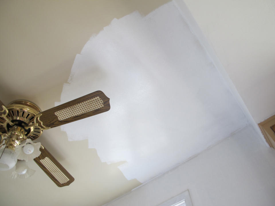 Paint the ceilings in your home (and replace dated ceiling fans).<p>Emily Fazio</p>